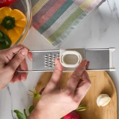 Crick Crack Harmony Edelstahl-Knoblauchreibe, Bunt