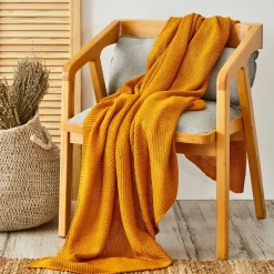 Karaca Home ocker Strickdecke Öko-Tex zertifiziert